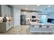 Modern kitchen with stainless steel appliances and an island at 13706 Werrington Dr, Winter Garden, FL 34787