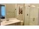 Modern bathroom with white subway tile, glass shower, and quartz vanity at 13706 Werrington Dr, Winter Garden, FL 34787