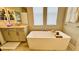 Luxury bathroom with soaking tub and separate shower at 13706 Werrington Dr, Winter Garden, FL 34787