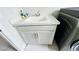 Convenient laundry room with a utility sink and washer/dryer hookups at 13706 Werrington Dr, Winter Garden, FL 34787