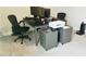 Home office features a large desk, two monitors, printer, and comfortable office chair at 13706 Werrington Dr, Winter Garden, FL 34787