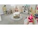 Playroom with a teepee, play kitchen, and clothes rack at 13706 Werrington Dr, Winter Garden, FL 34787