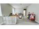 Spacious playroom with play furniture and storage at 13706 Werrington Dr, Winter Garden, FL 34787