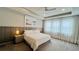 Primary bedroom with a king-size bed and calming decor at 13706 Werrington Dr, Winter Garden, FL 34787