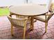 Round patio table with four rope chairs on a brick patio at 13706 Werrington Dr, Winter Garden, FL 34787