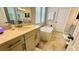 Spa-like bathroom featuring a freestanding soaking tub and modern vanity at 13706 Werrington Dr, Winter Garden, FL 34787
