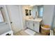 Elegant bathroom with soaking tub, quartz vanity, and walk-in shower at 13706 Werrington Dr, Winter Garden, FL 34787