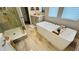 Relax in this bathroom with a large soaking tub and a separate shower at 13706 Werrington Dr, Winter Garden, FL 34787