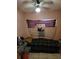 Small bedroom with air conditioner and double bed at 107 E Cypress St, Kissimmee, FL 34744