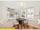 Small breakfast nook with table and chairs by window at 443 Corvina Dr, Davenport, FL 33897