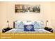 Bedroom with queen bed and ensuite bathroom at 443 Corvina Dr, Davenport, FL 33897