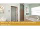 Bathroom with shower and tub attached to bedroom #1 at 443 Corvina Dr, Davenport, FL 33897