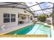 Private pool area with screened enclosure at 443 Corvina Dr, Davenport, FL 33897