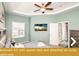 Bedroom with queen bed and attached en-suite bathroom at 443 Corvina Dr, Davenport, FL 33897