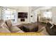 Spacious living area with TV and comfortable seating at 443 Corvina Dr, Davenport, FL 33897