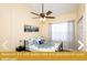 Bedroom with queen bed and attached en-suite bathroom at 443 Corvina Dr, Davenport, FL 33897