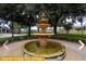 Ornate fountain in Tuscan Ridge community at 443 Corvina Dr, Davenport, FL 33897