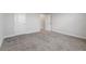 Empty bedroom with carpet, doors and neutral walls at 107 Hampton Loop, Davenport, FL 33837