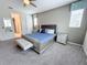 Elegant bedroom with a king-size bed and neutral decor at 1612 Herrons Green Path, Kissimmee, FL 34747