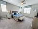 Elegant bedroom with a king-size bed and neutral decor at 1612 Herrons Green Path, Kissimmee, FL 34747