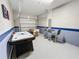 Game room with air hockey and foosball tables at 1612 Herrons Green Path, Kissimmee, FL 34747