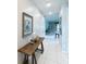 Inviting entryway with a console table and decorative accents at 1612 Herrons Green Path, Kissimmee, FL 34747