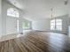 Bright living room with hardwood floors and high ceilings at 744 Stonewyk Way, Kissimmee, FL 34744