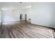Bright dining room features wood-look flooring and a stylish chandelier at 744 Stonewyk Way, Kissimmee, FL 34744