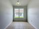 Small breakfast nook with tile flooring and a window overlooking the backyard at 744 Stonewyk Way, Kissimmee, FL 34744