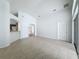 Open concept living room with kitchen views and tile flooring at 744 Stonewyk Way, Kissimmee, FL 34744