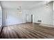 Spacious dining room with wood-look flooring and recessed lighting at 744 Stonewyk Way, Kissimmee, FL 34744