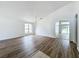 Dining room with wood-look flooring, chandelier, and view to the backyard at 744 Stonewyk Way, Kissimmee, FL 34744