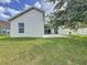 Spacious backyard with patio and grassy area at 744 Stonewyk Way, Kissimmee, FL 34744