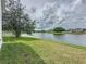 Serene lake view from the backyard at 744 Stonewyk Way, Kissimmee, FL 34744