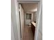Bathroom with toilet, sink, and washer/dryer at 4009 Shannon Brown Dr, Orlando, FL 32808