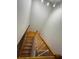 View of a clean, wooden staircase from above at 4009 Shannon Brown Dr, Orlando, FL 32808