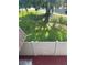Private backyard with white vinyl fence and red mulch at 4009 Shannon Brown Dr, Orlando, FL 32808