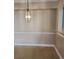 Simple dining area with tile flooring and a light fixture at 3701 Castle Pines Ln # 3914, Orlando, FL 32839
