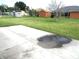Large backyard with grassy area and shed at 348 Jacksonville Ct, Kissimmee, FL 34759