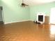 Spacious living room features hardwood floors, fireplace, and high ceilings at 348 Jacksonville Ct, Kissimmee, FL 34759