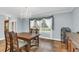 Elegant dining room featuring a chandelier and antique table at 4147 Boggy Creek Rd, Kissimmee, FL 34744