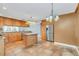 Kitchen boasts granite countertops and stainless steel appliances at 4147 Boggy Creek Rd, Kissimmee, FL 34744