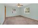 Light green bedroom with carpeted floor at 4147 Boggy Creek Rd, Kissimmee, FL 34744
