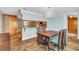Open concept dining room with kitchen views and tile floors at 4147 Boggy Creek Rd, Kissimmee, FL 34744