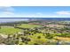 Aerial view of property near water and sports fields at 4147 Boggy Creek Rd, Kissimmee, FL 34744