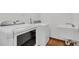 Convenient laundry room with washer, dryer, and utility sink at 4147 Boggy Creek Rd, Kissimmee, FL 34744