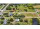 Aerial view of property with house and expansive lot at 4147 Boggy Creek Rd, Kissimmee, FL 34744