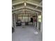 Spacious workshop with ample storage shelving and workbench at 4147 Boggy Creek Rd, Kissimmee, FL 34744