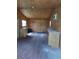 Spacious workshop with wood cabinets and AC unit at 4147 Boggy Creek Rd, Kissimmee, FL 34744
