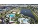 Community features a lake, pool, playground, and sports areas at 1612 Herrons Green Path, Kissimmee, FL 34747